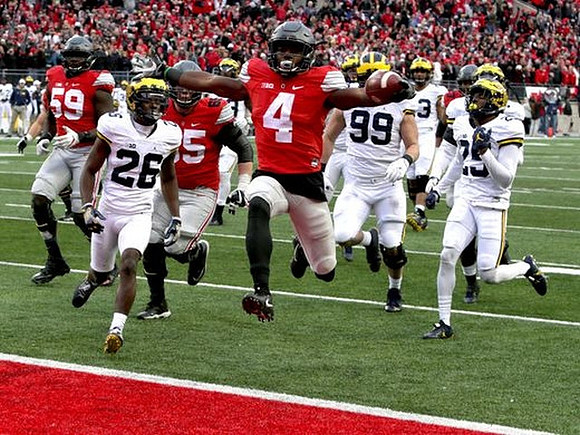 Jourdan Lewis (26), Matthew Godin (99), and Dymonte Thomas (25)