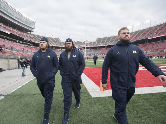 Mason Cole (52), Erik Magnuson (78), and Kyle Kalis (67)