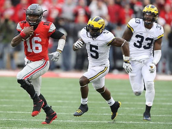 Jabrill Peppers (5) and Taco Charlton (33)