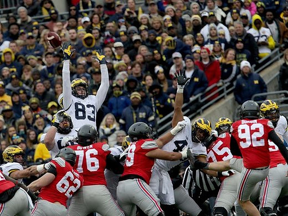 Zach Gentry (83) and Chris Wormley (43)