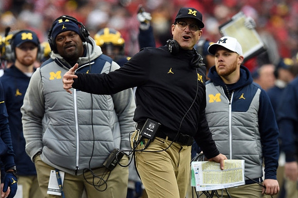 Tyrone Wheatley Sr. and Jim Harbaugh