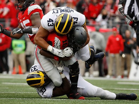 Taco Charlton (33) and Chris Wormley (43)