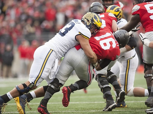 Chris Wormley (43) and Ryan Glasgow (96)