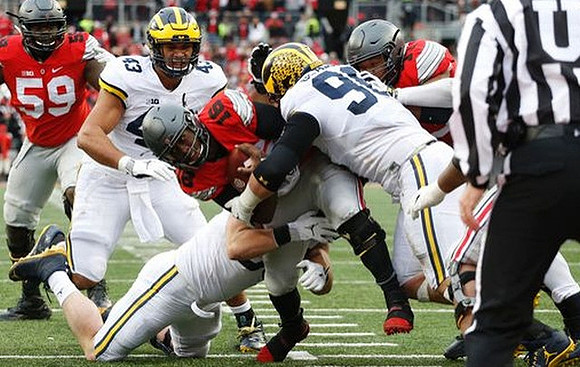 Chris Wormley (43) and Ryan Glasgow (96)
