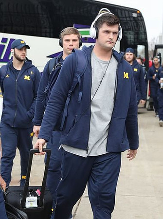 Wilton Speight (3) and Michigan Team