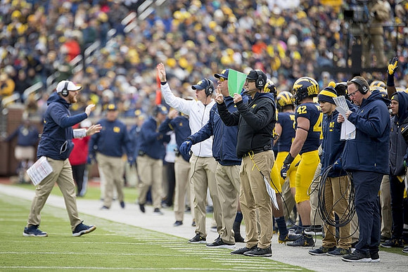 Jay Harbaugh, Greg Frey, Jim Harbaugh, Ben Mason (42), and Tim Drevno