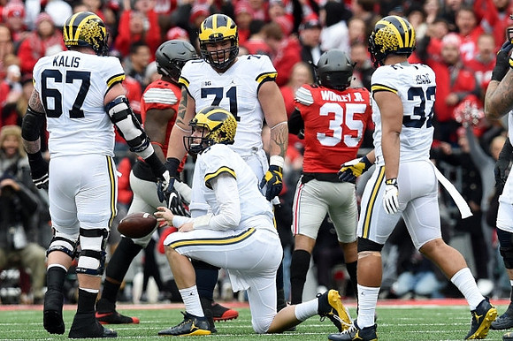 Kyle Kalis (67), Ben Braden (71), Wilton Speight (3), and Ty Isaac (32)