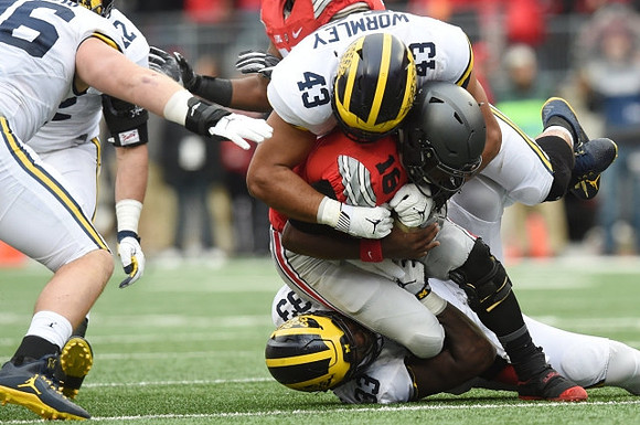 Ryan Glasgow (96), Ben Gedeon (42), Chris Wormley (43), and Taco Charlton (33)