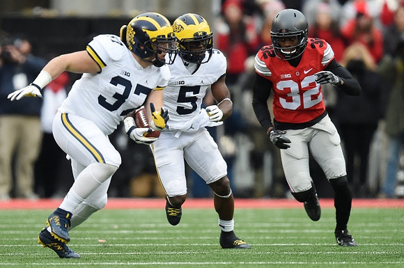Bobby Henderson (37) and Jabrill Peppers (5)