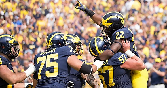 Jon Runyan Jr. (75), Patrick Kugler (57), and Karan Higdon (22)