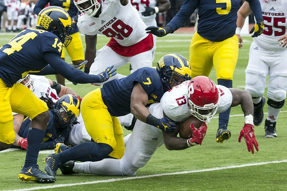 Josh Metellus (14) and Khaleke Hudson (7)