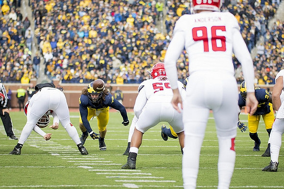 Jordan Glasgow (29) and J'Marick Woods (26)