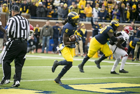 Kareem Walker (6) and Michael Onwenu (50)