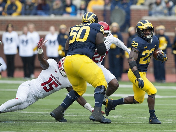 Michael Onwenu (50) and Karan Higdon (22)