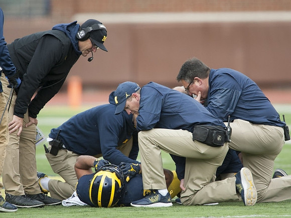 Jim Harbaugh and Ty Isaac (32)
