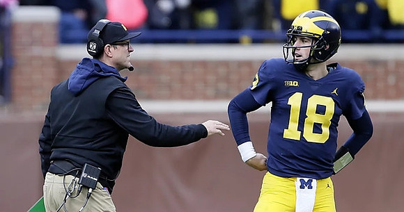 Jim Harbaugh and Brandon Peters (18)
