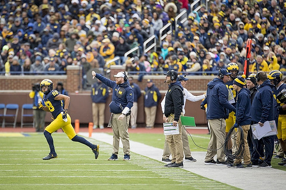 Grant Perry (88), Jay Harbaugh, and Jim Harbaugh