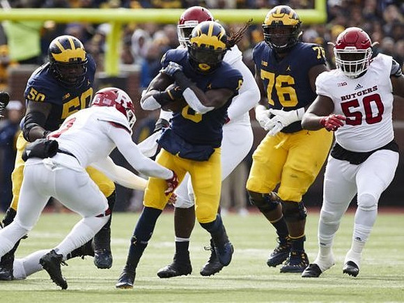 Michael Onwenu (50), Kareem Walker (6), and Juwann Bushell-Beatty (76)