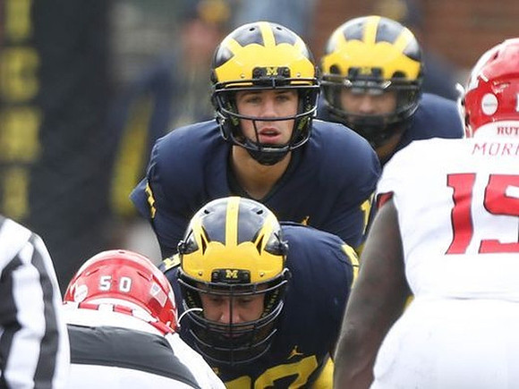 Patrick Kugler (57) and Brandon Peters (18)
