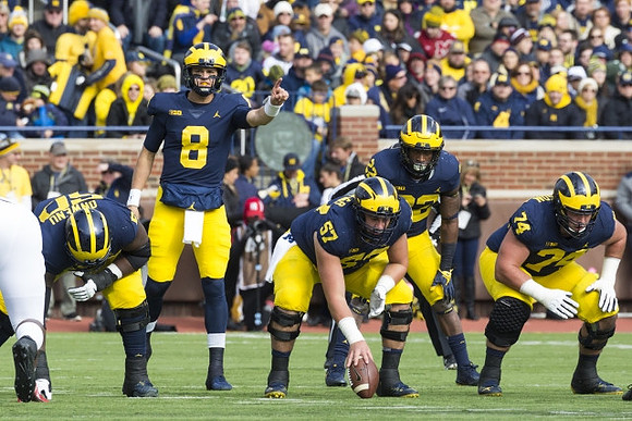 Michael Onwenu (50), John O'Korn (8), Patrick Kugler (57), Karan Higdon (22), and Ben Bredeson (74)