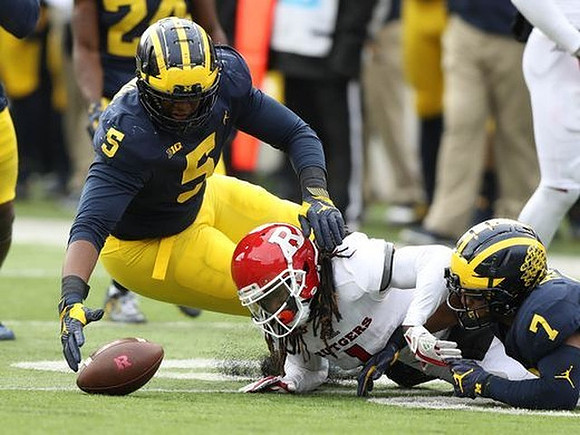 Aubrey Solomon (5) and Khaleke Hudson (7)