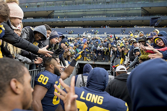 Khalid Hill (80) and David Long (22)