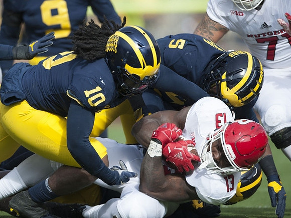 Devin Bush (10), Aubrey Solomon (5), and Mike McCray (9)