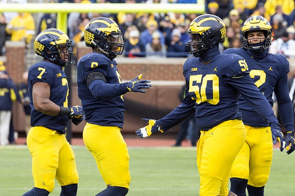 Mike McCray (9), Josh Metellus (14), Carlo Kemp (2), and Michael Dwumfour (50)