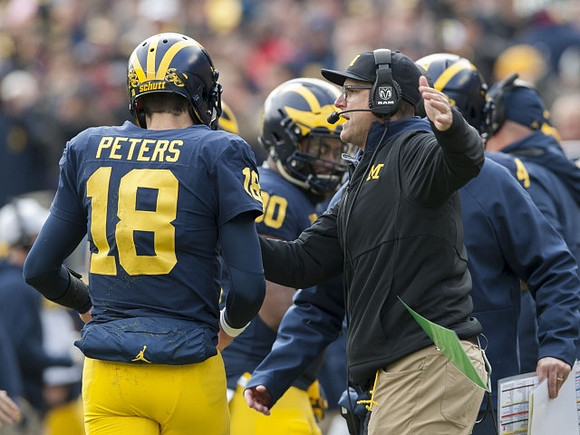 Brandon Peters (18) and Jim Harbaugh