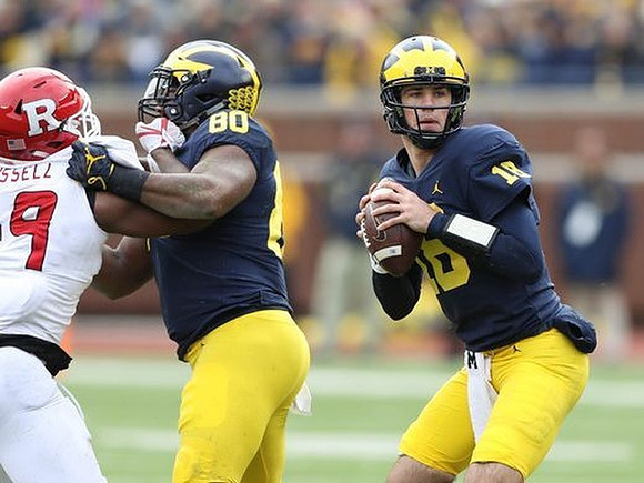 Khalid Hill (80) and Brandon Peters (18)