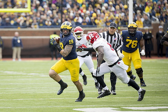 Henry Poggi (19) and Juwann Bushell-Beatty (76)