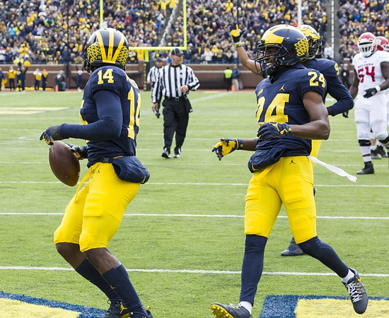 Josh Metellus (14), Lavert Hill (24), and Mike McCray (9)