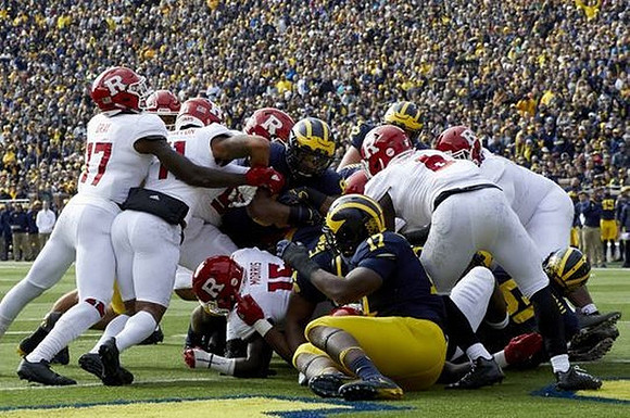 Khalid Hill (80) and Tyrone Wheatley Jr. (17)