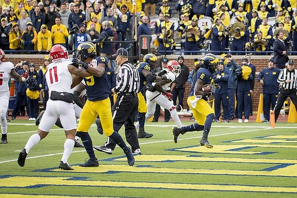 Donovan Peoples-Jones (9), Michael Onwenu (50), and Kareem Walker (6)