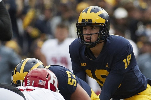 Patrick Kugler (57) and Brandon Peters (18)