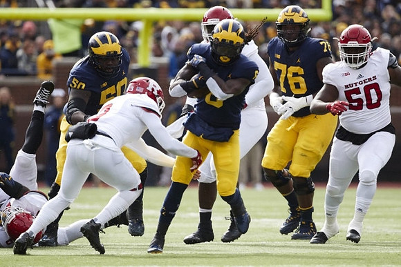 Michael Onwenu (50), Kareem Walker (6), and Juwann Bushell-Beatty (76)
