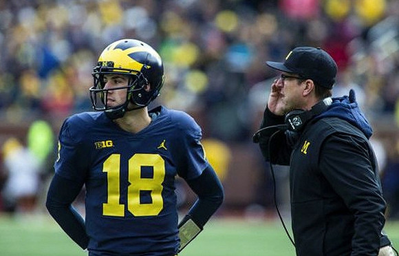 Brandon Peters (18) and Jim Harbaugh