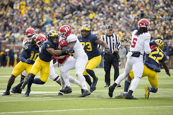 Devin Bush (10), Khaleke Hudson (7), Maurice Hurst (73), and David Long (22)