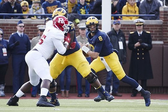 Juwann Bushell-Beatty (76) and John O'Korn (8)