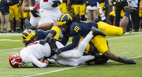 Rashan Gary (3) and Devin Bush (10)