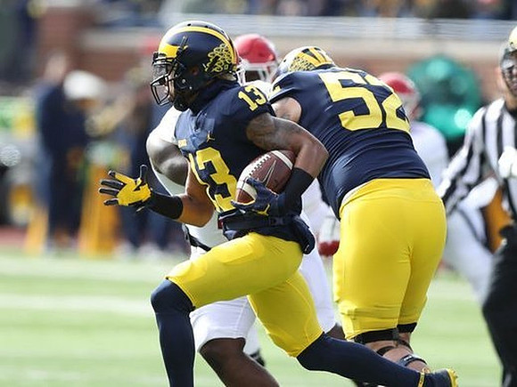 Eddie McDoom (13) and Mason Cole (52)