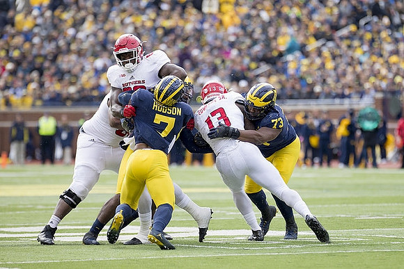 Khaleke Hudson (7) and Maurice Hurst (73)