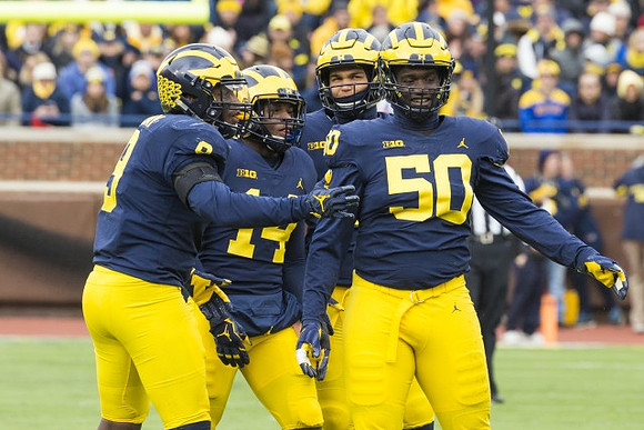 Mike McCray (9), Josh Metellus (14), Carlo Kemp (2), and Michael Dwumfour (50)