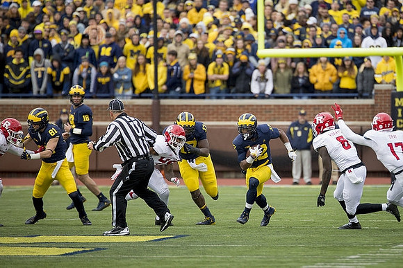 Nate Schoenle (81), Brandon Peters (18), Tyrone Wheatley Jr. (17), and Chris Evans (12)