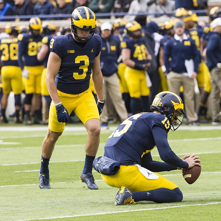 Quinn Nordin (3) and Garrett Moores (15)