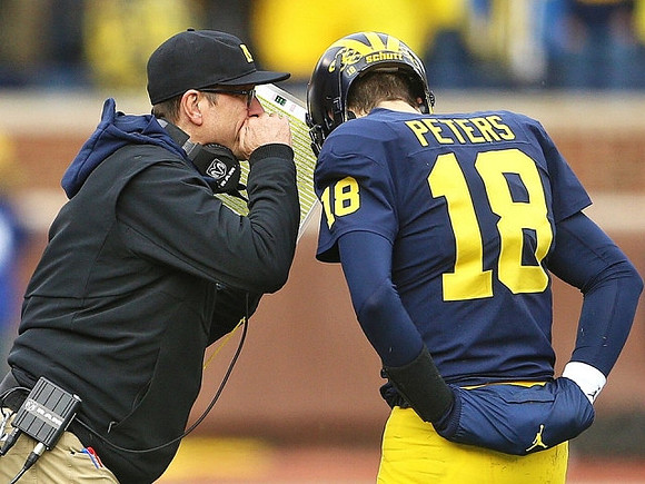 Jim Harbaugh and Brandon Peters (18)
