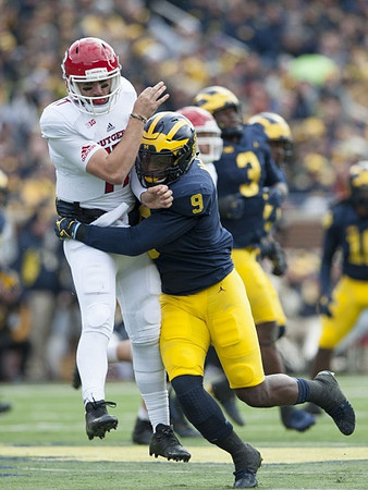 Mike McCray (9) and Rashan Gary (3)