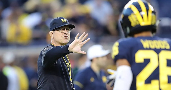 Jim Harbaugh and J'Marick Woods (26)