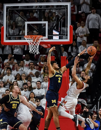 Austin Davis (51) and Isaiah Livers (2)