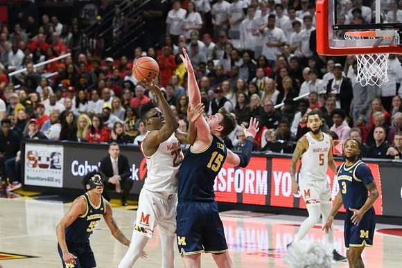 Eli Brooks (55), Jon Teske (15), and Zavier Simpson (3)